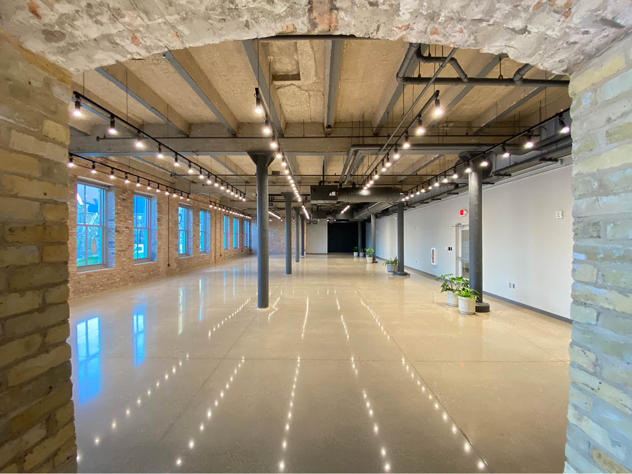 Historic Cream City brick interior at The Barley Room event venue in Milwaukee